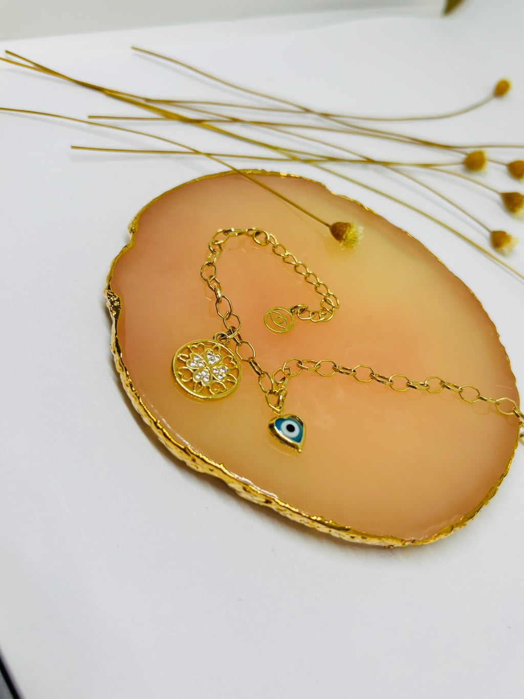 Pulseira Olho Grego e Flor da Vida