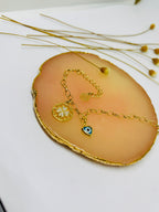 Pulseira Olho Grego e Flor da Vida