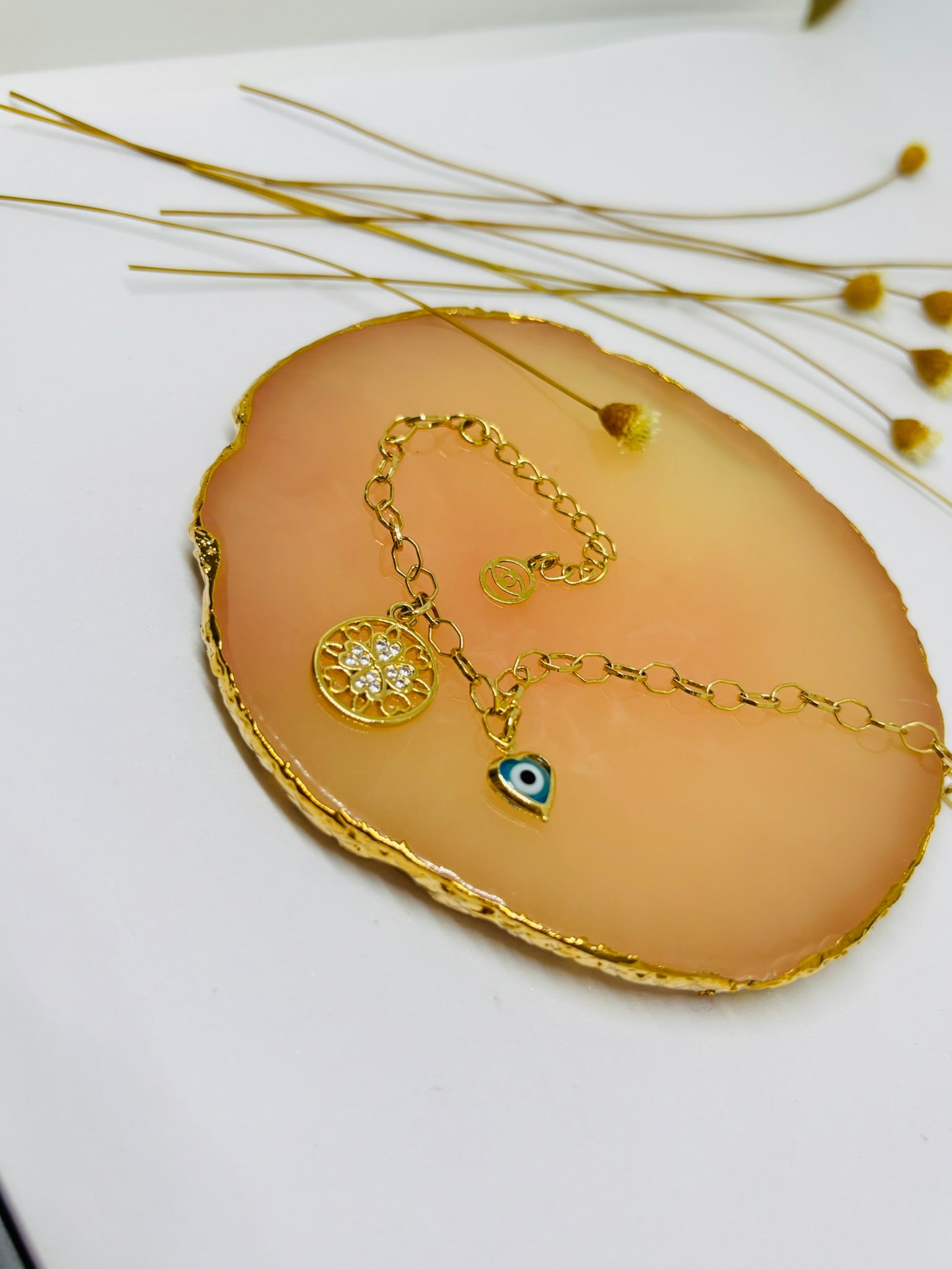 Pulseira Olho Grego e Flor da Vida