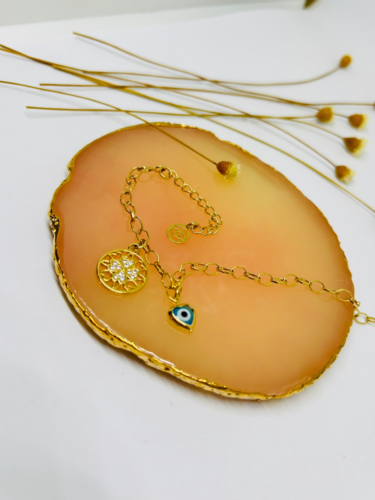 Pulseira Olho Grego e Flor da Vida